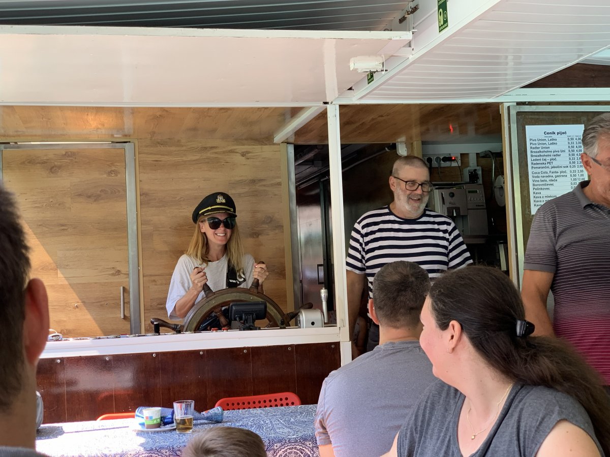 Mums and children get invited to drive the boat and wear the captain's hat.. Mums and children get invited to drive the boat and wear the captain's hat..