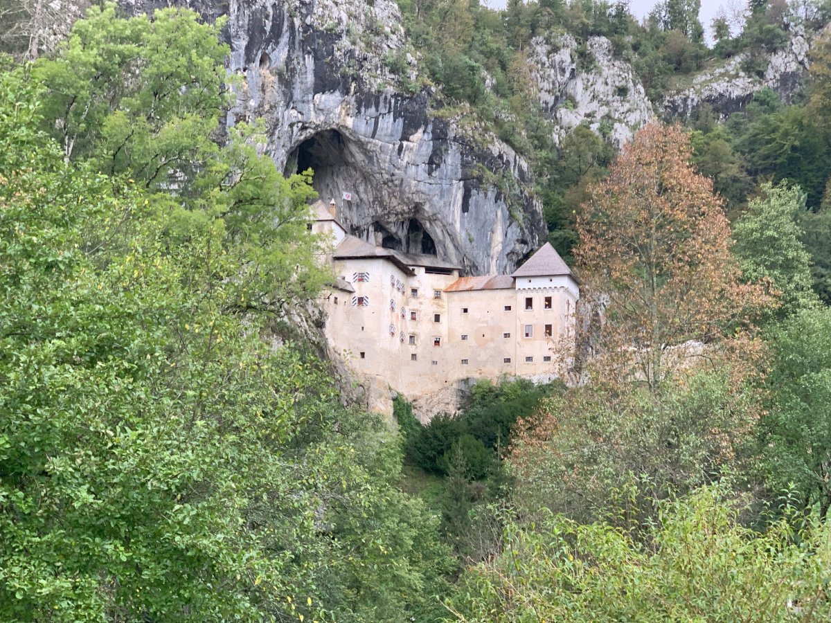This will be your very first view of Predjama castle if you walk direct from the Lodge on a secret path.. This will be your very first view of Predjama castle if you walk direct from the Lodge on a secret path..