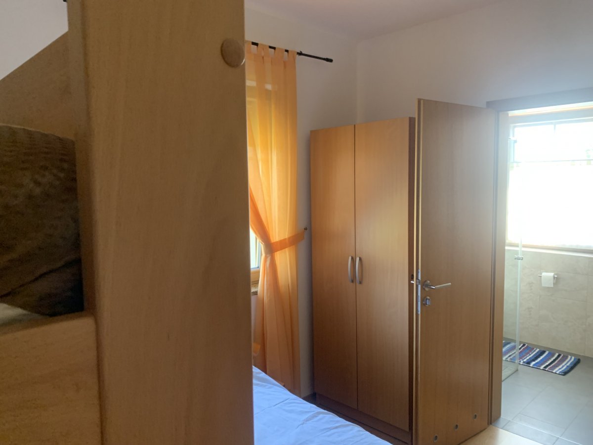 lovely en suite bathroom with big glass door shower..