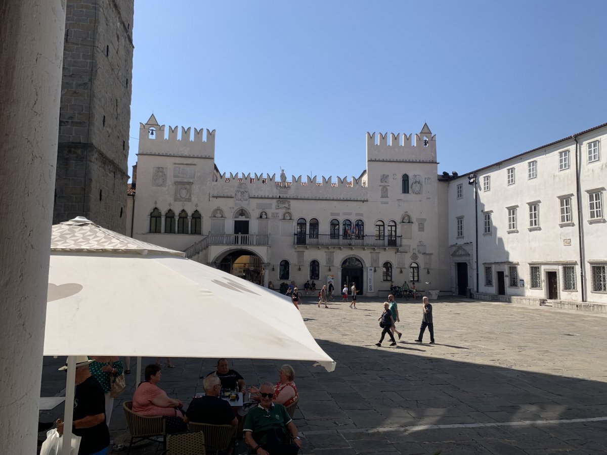 This is one of the most beautiful enclosed town squares in Green Slovenia.. do have a coffee here and an ice cream next to the sea..