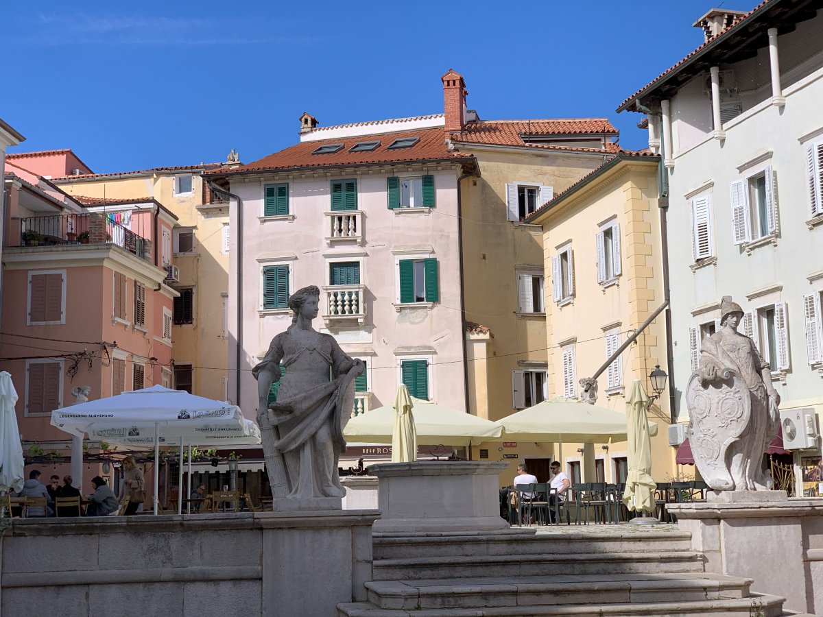Suddenly you pop out into a square like this serving the best calamari in town.. Suddenly you pop out into a square like this serving the best calamari in town..