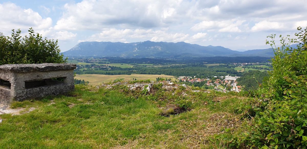 view of Nanos mountain across the Postojna valley.. the Lodge is below the mountain on the left..