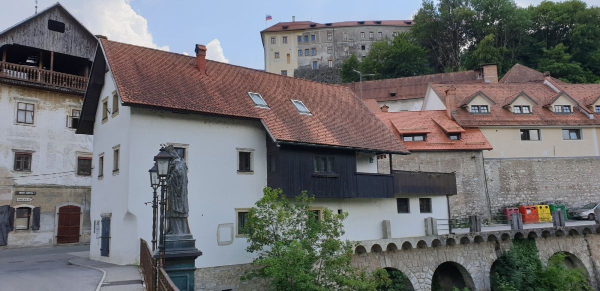 crossing the river into the old town with the castle above..