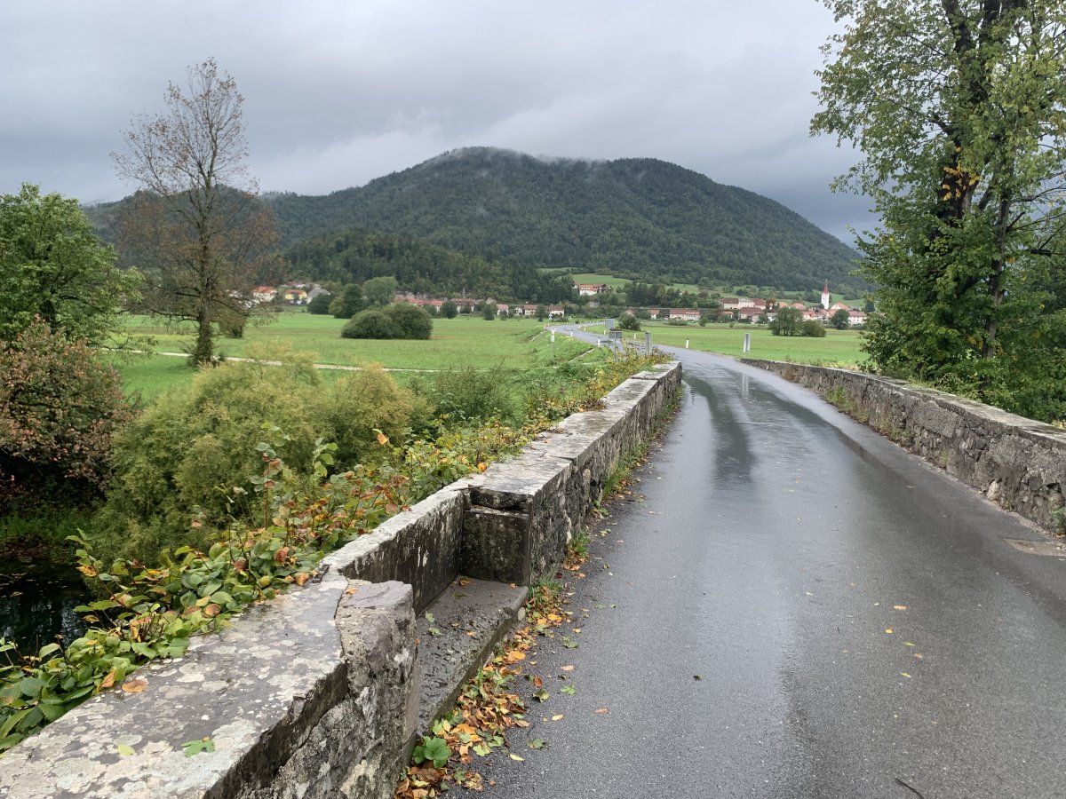 Planina hill in the background and the only road that survives the lake leads from Planina to here.. Planina hill in the background and the only road that survives the lake leads from Planina to here..
