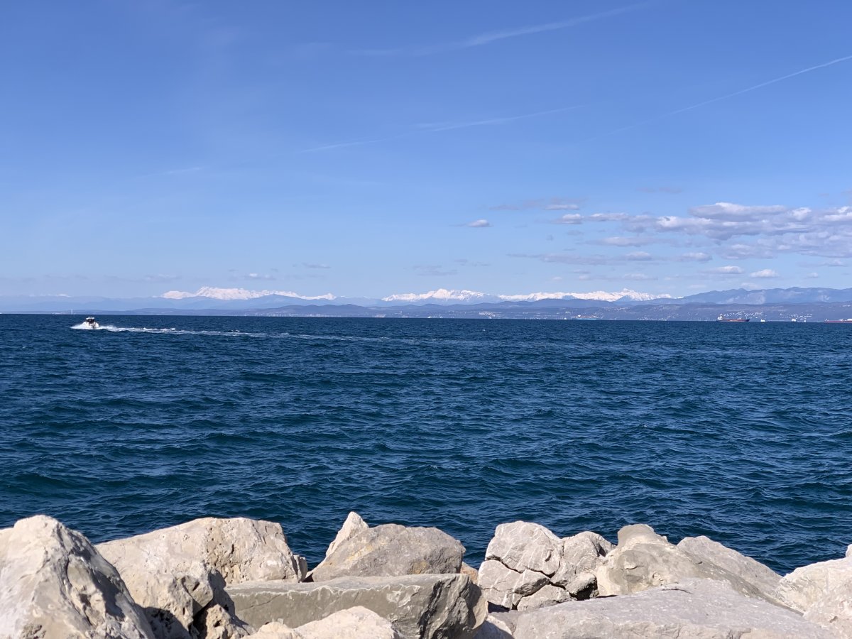 Green Slovenia is so rinky dinky small you can easily see the main snow covered Alps here from the coast at Izola! Green Slovenia is so rinky dinky small you can easily see the main snow covered Alps here from the coast at Izola!