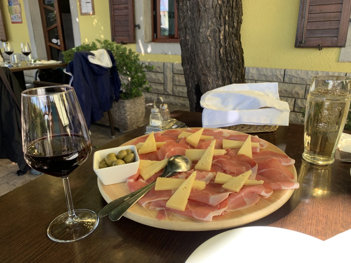a Glass of Teran wine with some Slovenian Tapas.. a Glass of Teran wine with some Slovenian Tapas..