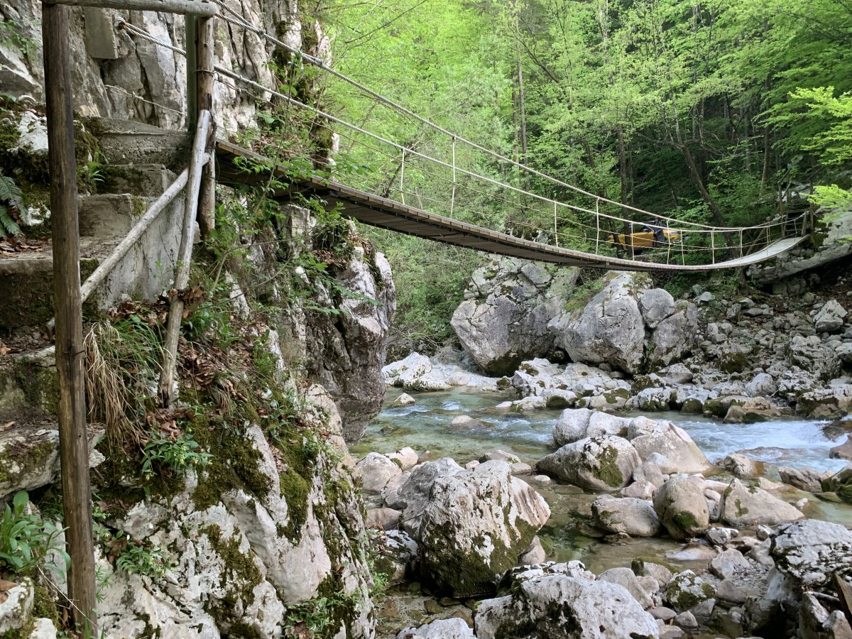 Cross the wonky bridge and sit on a rock in the river.. Cross the wonky bridge and sit on a rock in the river..