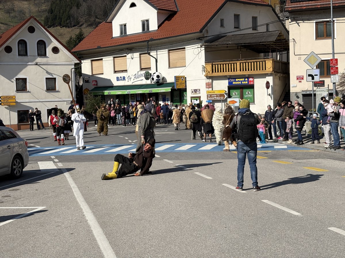 the drunk Wife drags the drunk Husband through the streets..