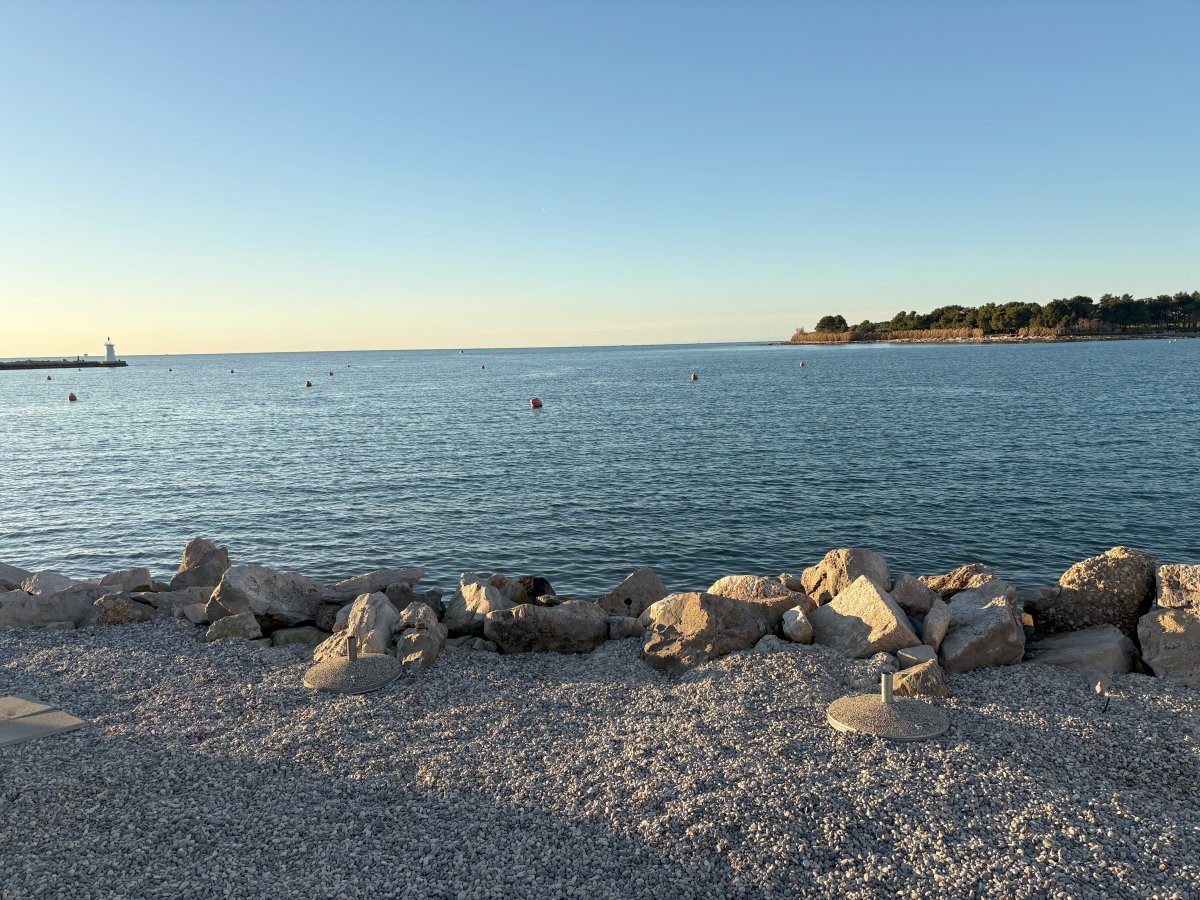 Pebble beach at Novigrad.. Pebble beach at Novigrad..