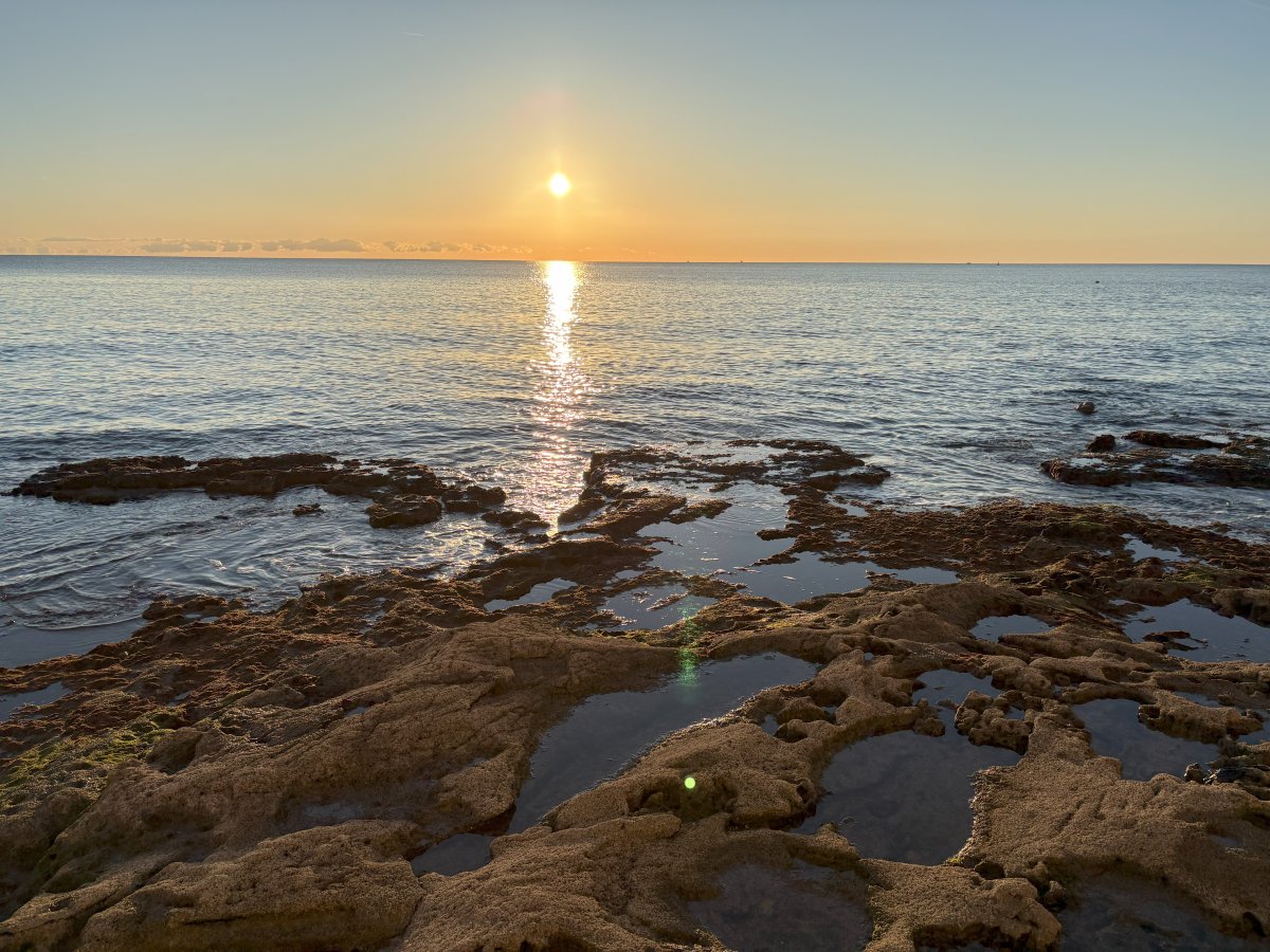 Typical Adriatic rock beach with lake like Medieterranean sea at Novigrad.. Typical Adriatic rock beach with lake like Medieterranean sea at Novigrad..