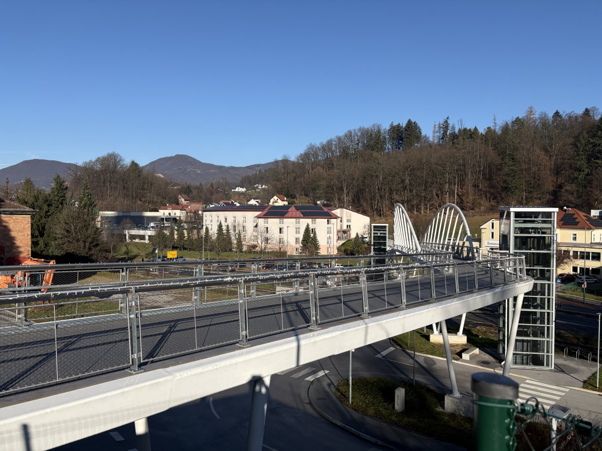 A really modern foot bridge connects the tower with the town.. A really modern foot bridge connects the tower with the town..
