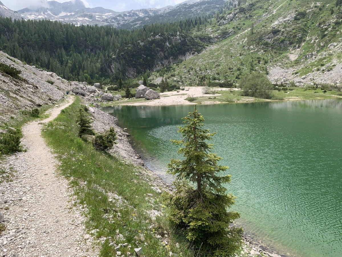 Just imagine hiking to the highest lake in Slovenia and finding a white beach at the far end.. Just imagine hiking to the highest lake in Slovenia and finding a white beach at the far end..
