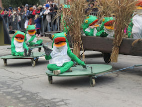 froglets appear from the lake in slovenian carnival