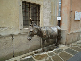 metal donkey outside train museum in slovenia