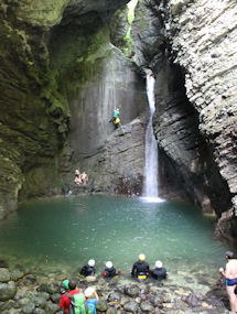 swim by an amaing waterfall in slovenia